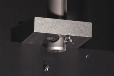 HEULE precision tool automatically deburring the backside of a metal borehole in a single operation.